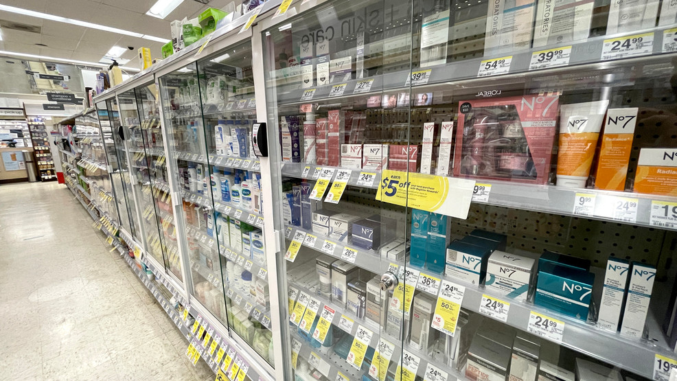 Products are displayed in locked security cabinets at a Walgreens store that is set to be closed in the coming weeks on October 13, 2021 in San Francisco, California.
