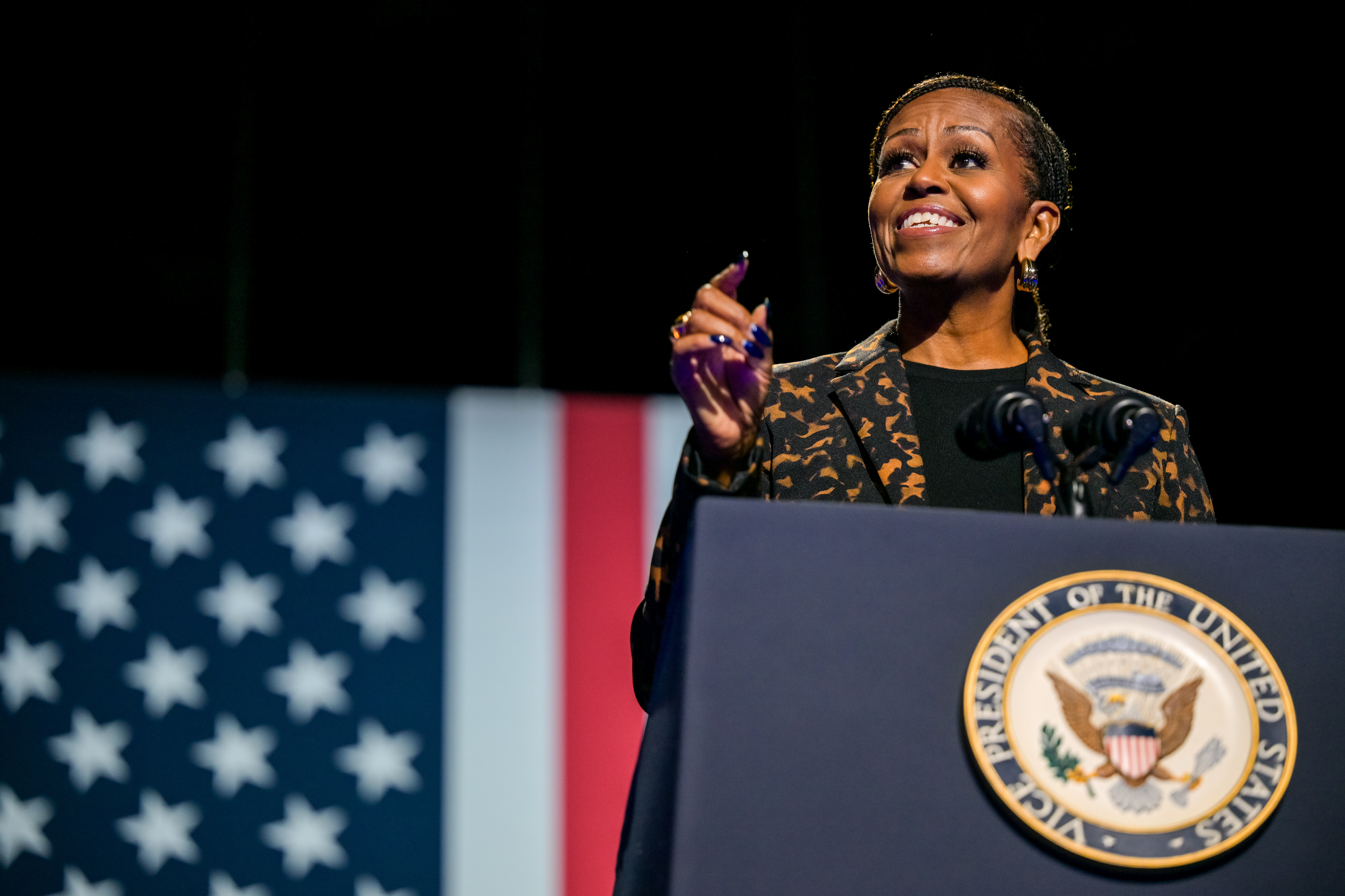 KALAMAZOO, MICHIGAN - OCTOBER 26: Former first lady Michelle Obama speaks ahead of the arrival of Democratic presidential nominee, U.S. Vice President Kamala Harris during a campaign rally at the Wings Event Center on October 26, 2024 in Kalamazoo, Michigan. Vice President Harris will be campaigning today with former first lady Michelle Obama in the battleground swing state of Michigan. With 10 days remaining, Harris continues campaigning against Republican presidential nominee, former U.S. President Donald Trump ahead of the November 5 election. (Photo by Brandon Bell/Getty Images)
