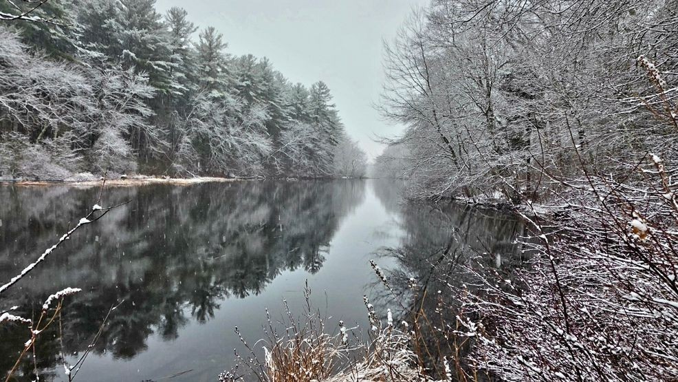 Image for story: Parking and roads affected by snowfall