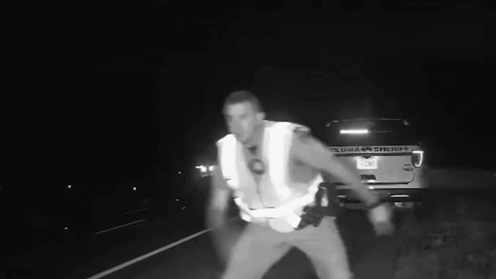 Image for story: Driver narrowly misses trooper and deputy on Florida highway