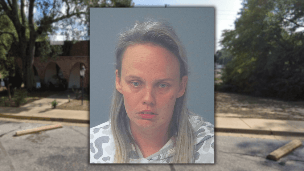 Image for story: Police: Video shows woman repeatedly hit hound dog at Milton dog grooming business