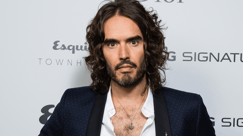 Image for story: Russell Brand granted bail after virtual court appearance for new sexual assault charges