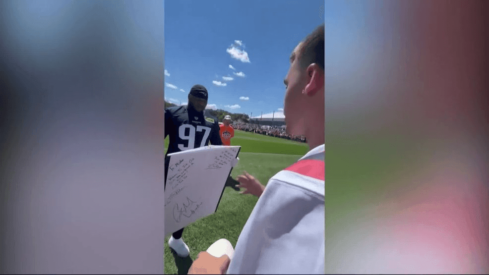 Cameron Carreiro giving the players his signs. (WJAR)