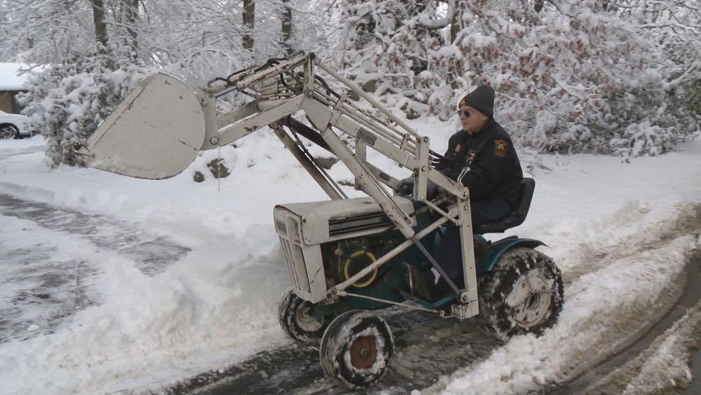 Southern New Englanders clean up several inches of snow. (WJAR)