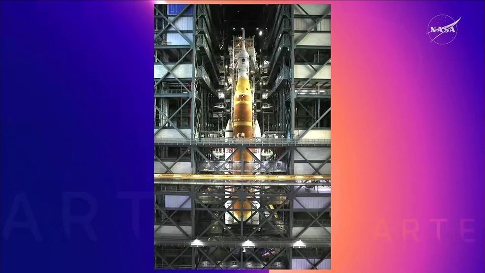 Image for story: Artemis II rocket begins slow journey to launch pad Saturday