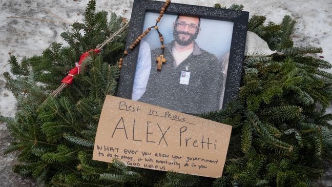 MINNEAPOLIS, MINNESOTA - JANUARY 25: A picture sits at a memorial to Alex Pretti on January 25, 2026 in Minneapolis, Minnesota. Pretti, an ICU nurse at a VA medical center, died on January 24 after being shot multiple times during a brief altercation with border patrol agents in the Eat Street district of Minneapolis.  (Photo by Scott Olson/Getty Images)