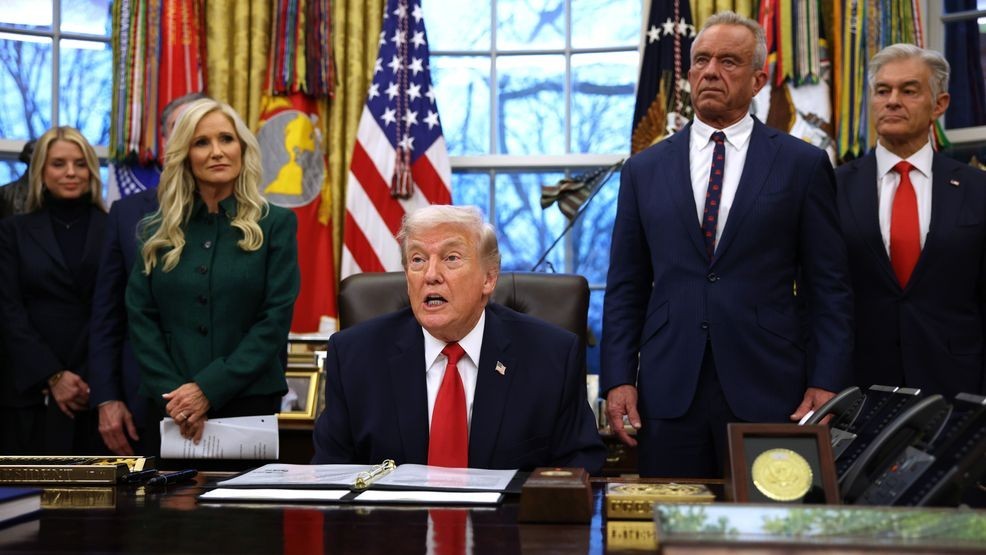 President Donald Trump speaks in the Oval Office at the White House with U.S. Secretary of Health and Human Services Robert F. Kennedy Jr.