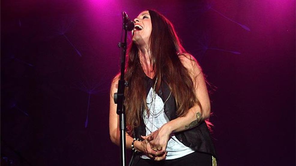 Canadian Singer Alanis Morissette performs at The Paramount in Huntington, New York on Sunday Aug. 26, 2012. (Photo by Donald Traill/Invision/AP)