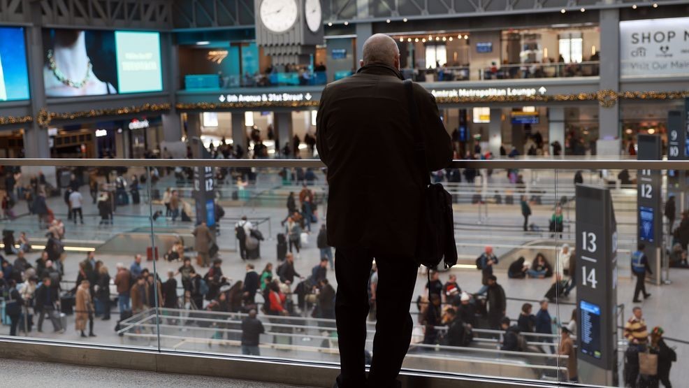 FILE - A man looks out at the Moynihan Train Hall on December 18, 2025, in New York City. (Photo by Spencer Platt/Getty Images)