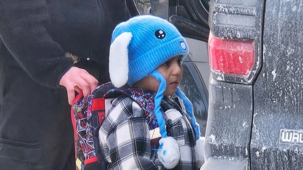 Liam Conejo Ramos, 5, is detained by U.S. Immigration and Customs Enforcement officers after arriving home from preschool, Tuesday, Jan. 20, 2026, in a Minneapolis suburb. (Ali Daniels via AP)