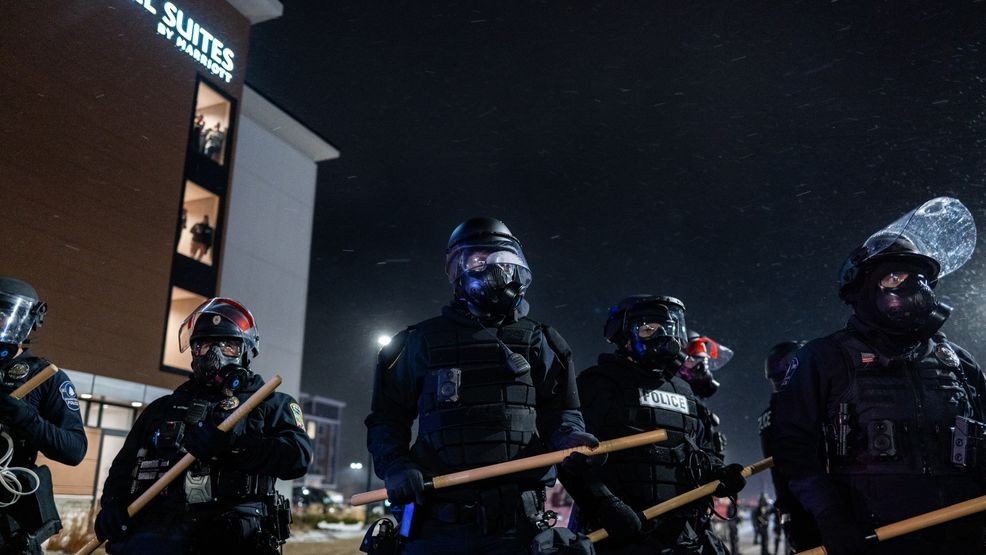 Image for story: Moon over Minneapolis: Protestors get cheeky display during anti-ICE demonstration